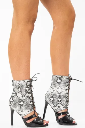 White Black Faux Snake Lace Up Stiletto Boots - Zen